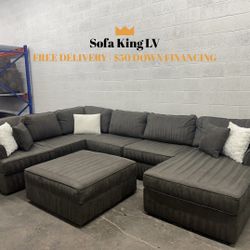 Free Delivery* Like New Dark Gray Sectional Sofa with Ottoman!