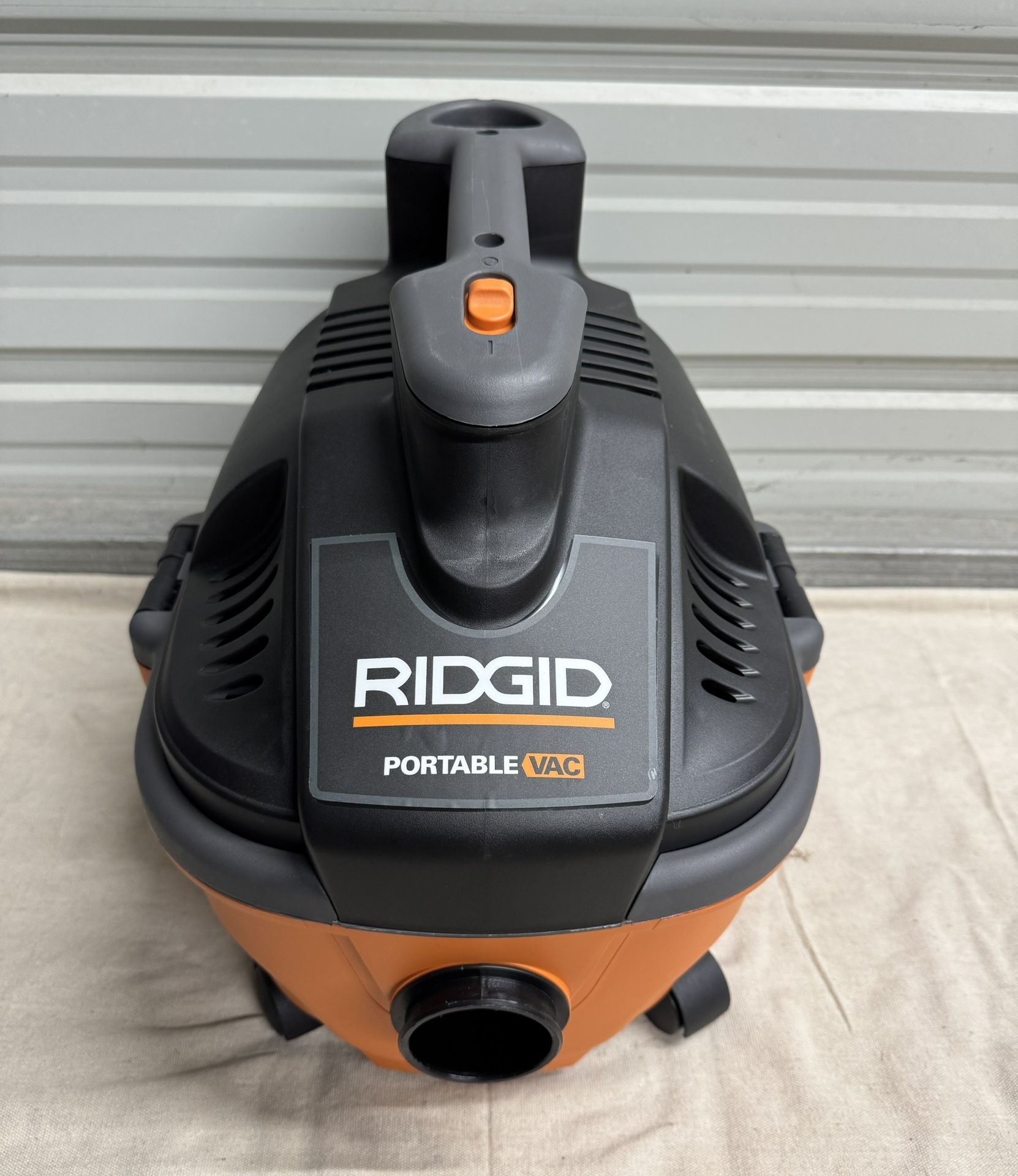 RIDGID 4 Gal. 5.0 Peak HP Portable Shop Vacuum WD4070 Wet Dry Vac with Fine Dust Filter, Locking Hose and Attachments