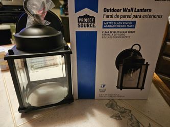 Outdoor wall lantern, matte black finish, clear beveled glass shade