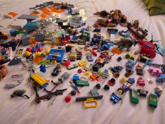 Large Lot of Mixed LEGO Pieces and Minifigures