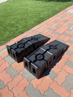 Rhino Ramps. Stored inside. Good condition.