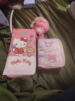 2 Hello Kitty wallets + Pom keychain