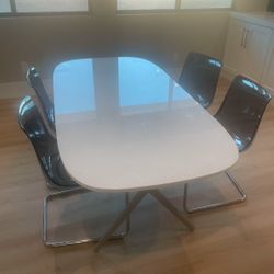 White Dining Table And Four Chairs 