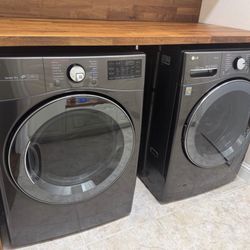 LG 4.5 Cu. Ft. Front Load Washer and 7.4 Cu. Ft. Gas Dryer with Turbowash 360 Lau...