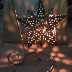 Metal star candle holder
