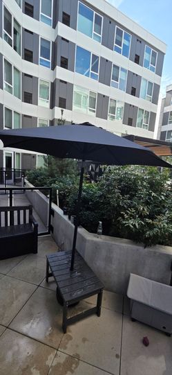 Black Outdoor Patio coffee table and Umbrella