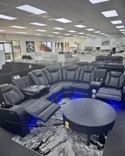Power Reclining Sectional w/LED light, Wireless surround system, USB charger, & more