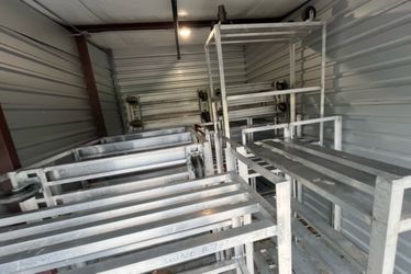 Commercial Aluminum freezer/cooler shelves and Carts shelving without wheels start at $50 with 2 sheves and the ones with wheels start at $150-$200 ea