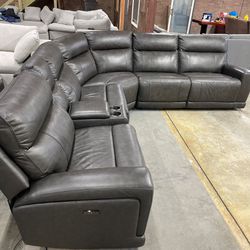 6-Piece Leather Power Reclining Sectional With Power Headrests By Gilman Creek.