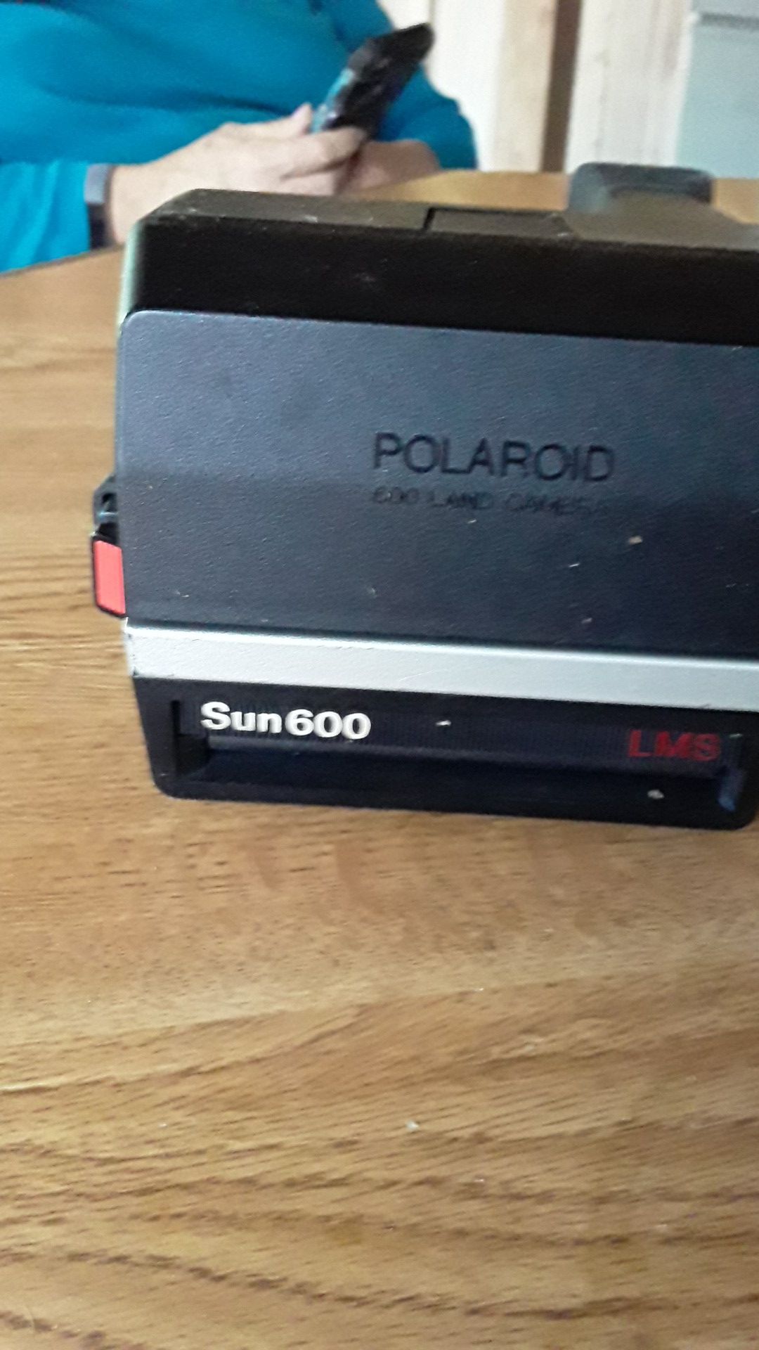 Polaroid Sun 600 LMS with original purchase receipt from 1988