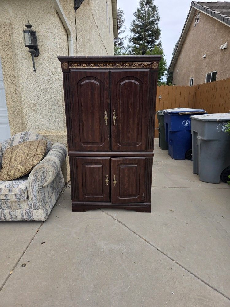 This is a Kincaid Furniture Cherry Mountain III Traditional Style media armoire in solid cherry wood.