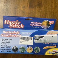 A Handy Stitch handheld sewing machine. 
