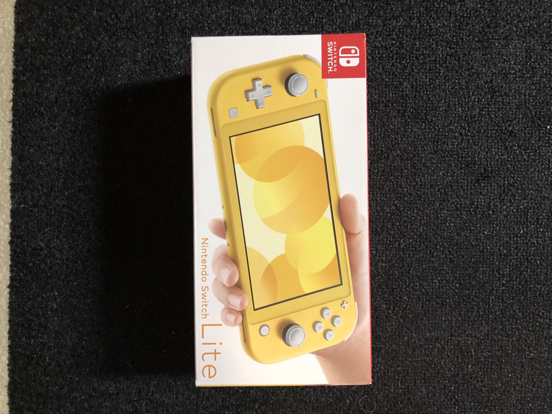Nintendo Switch Lite NEW IN BOX. In hand. No trades
