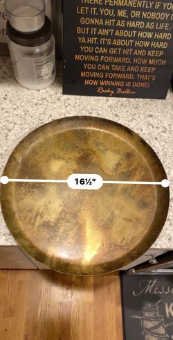 round, antiqued tray. It measures 16.5" MADE IN INDIA 