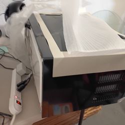 Microwave oven never used!