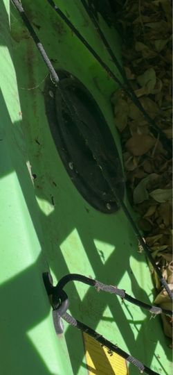 Tomahawk 12 foot kayak with a storage container