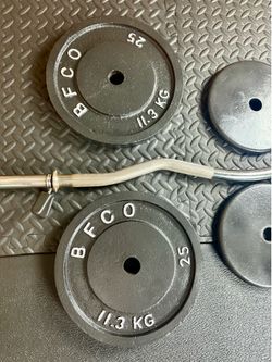 48 inches Steel Standard Barbell W/Weight Plates: 25s, 10s and 5s ponders. 93 # Brute W.