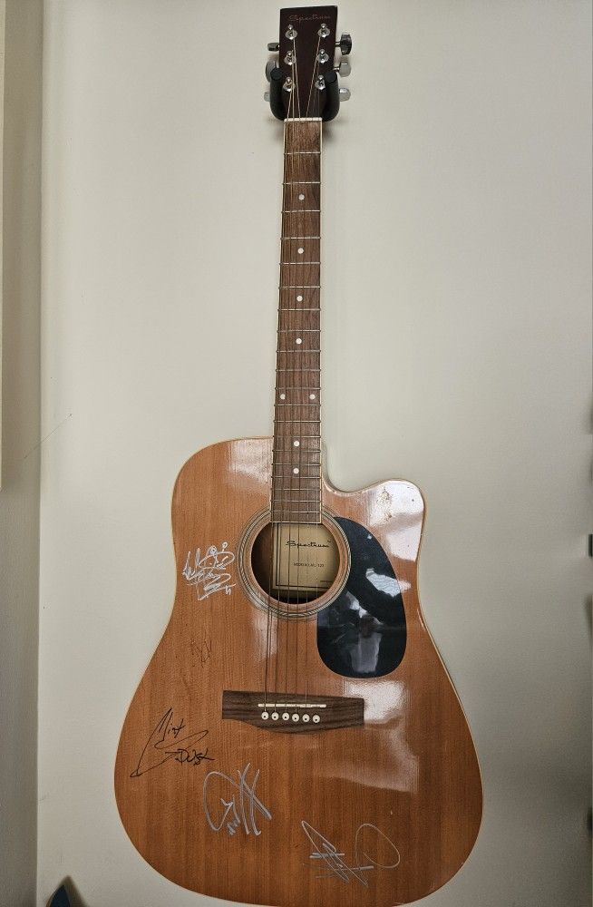 Autographed SEVENDUST guitar