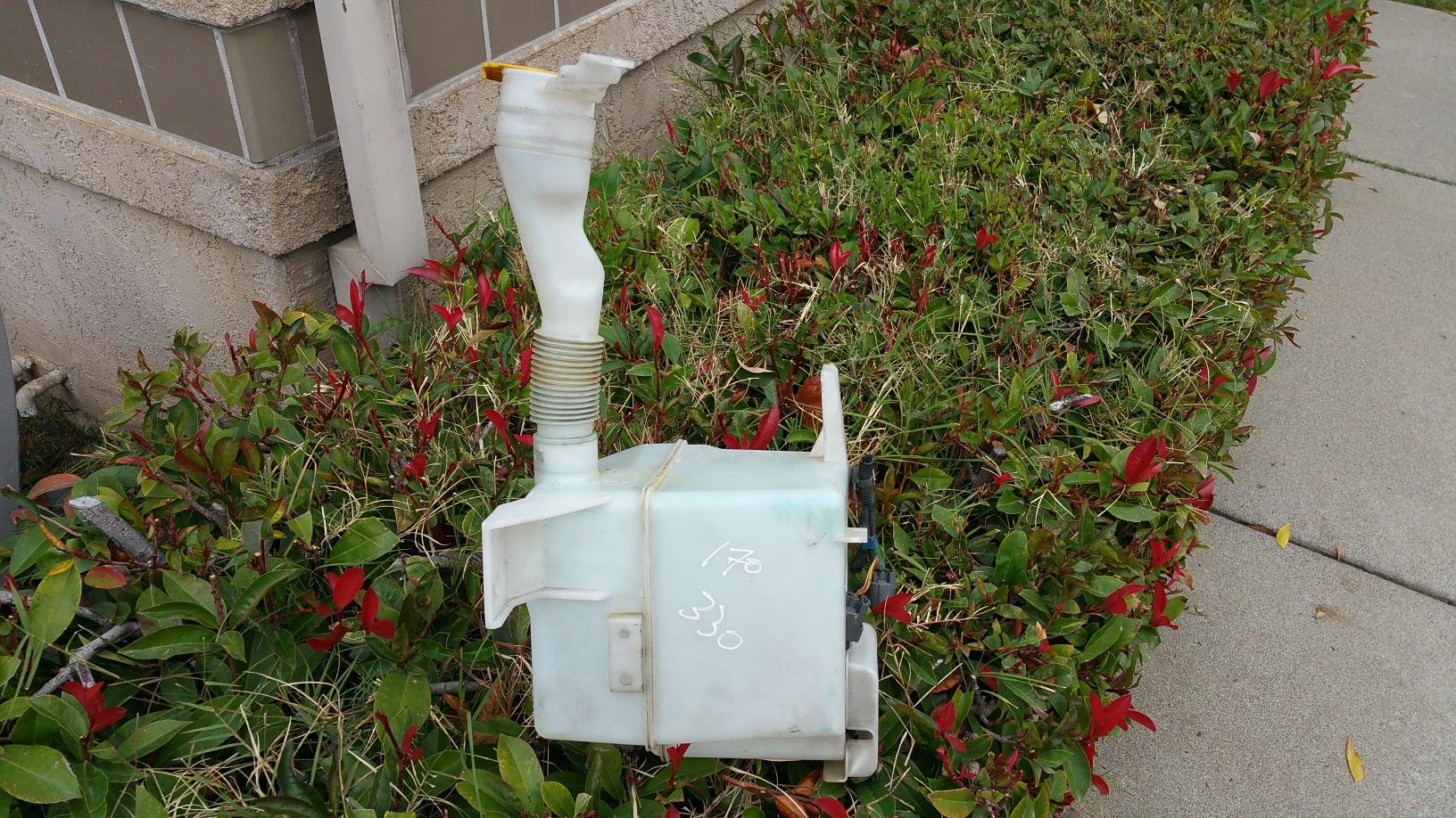 2010 subaru impreza windshield washer reservoir