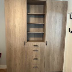 Wooden wardrobe With Shelves And Drawers