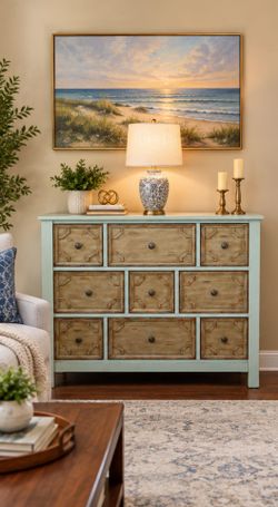 Solid wood vintage chest drawers with 9 drawers in good condition, all drawers with bronze hardware working well,

This versatile 9-drawer dresser ble