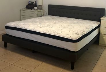 King-sized Upholstered bed frame and 12 inch deep king mattress