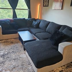 Large Grey Pullout Sectional With Cushion Covers