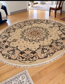 10 x8.5 oval Persian-Style Area Rug with Fringe