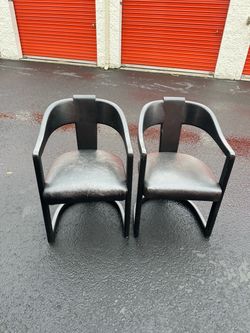 Pair of Black Barrel Accent Chairs
