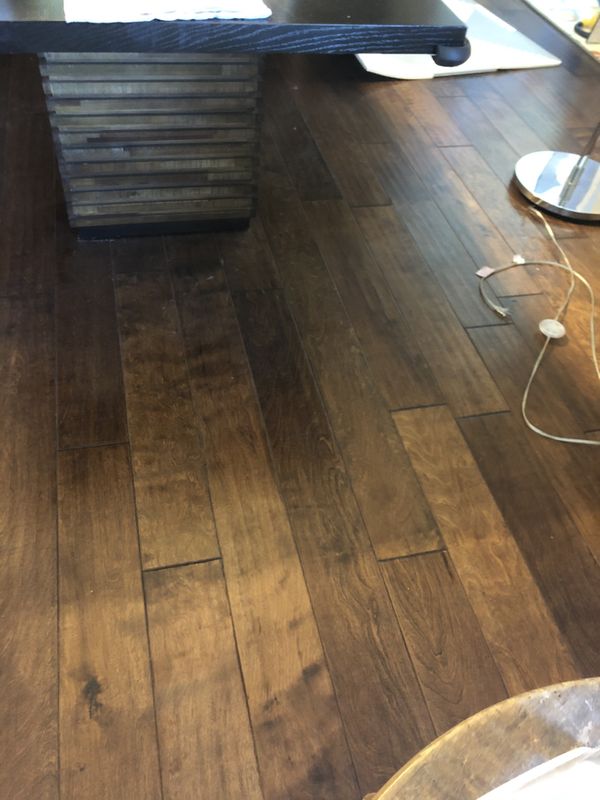 Hand scrapped engineered hardwood flooring. 850 square