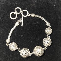 Round Filigree Frangipani Floral Toggle Clasp Bracelet