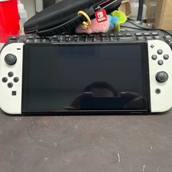 Nintendo switch oled with both legend of Zelda games