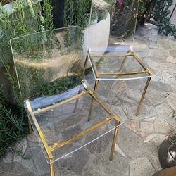 Clear Acrylic Chair In Gold.