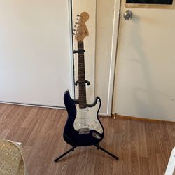 Unused Fender guitar +amp, cables, stand, and capo!