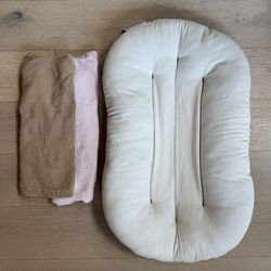 Snuggle me organic lounger.