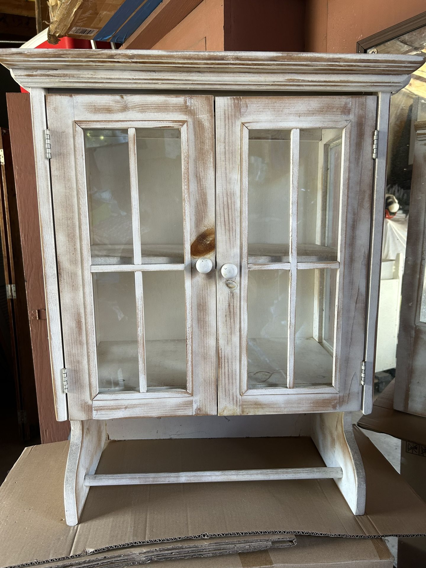 Antique solid wood bathroom cabinet, measures 29" high x 23" wide.