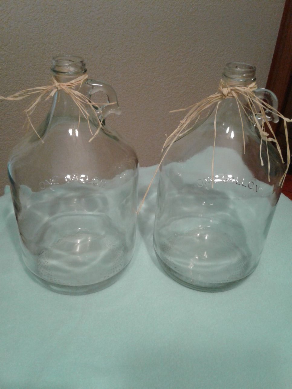 One gallon glass bottles