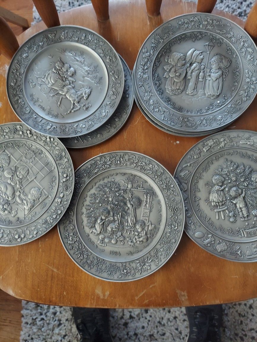Beautiful Pewter Collectable Plates .