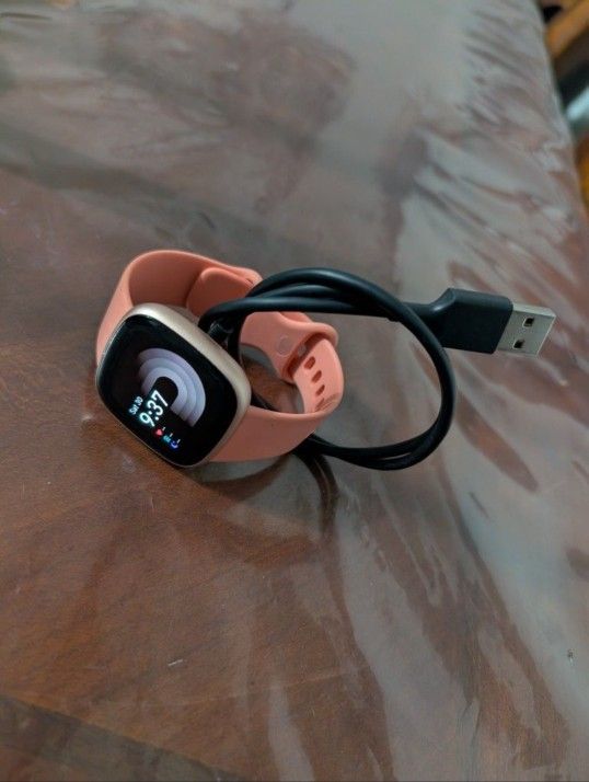 Fitbit Smartwatches And Garmin Vivo smart 4