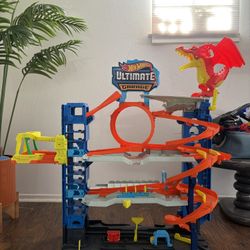 Hot Wheels City Ultimate Garage Track Set with 2 Die-Cast Toy Cars & Car-Eating Dragon, Stores 50+ Vehicles, 4 Levels