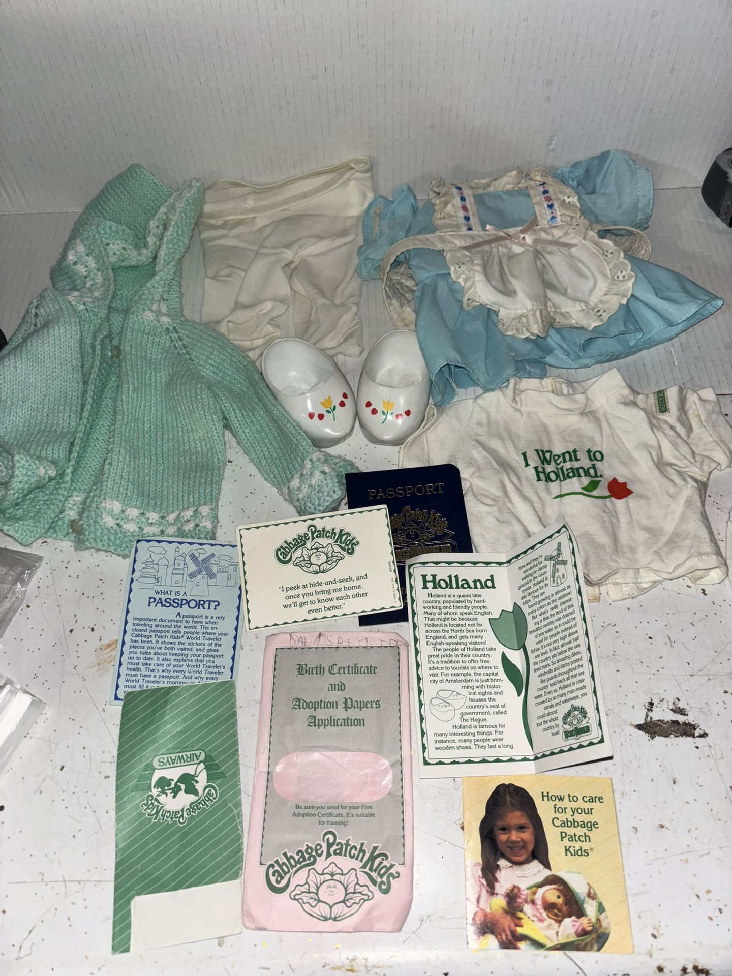Vintage cabbage patch clothing and passport and papers