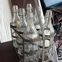 6 Vintage Glass Bottles With Lids In Metal Carrying Rack