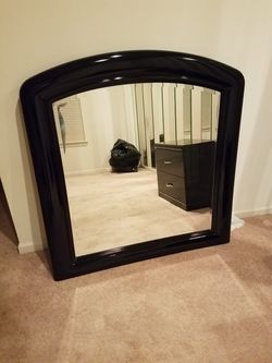 Mirror in thick black frame