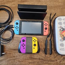 Nintendo Switch with 4 JoyCons and Crash Bandicoot Case