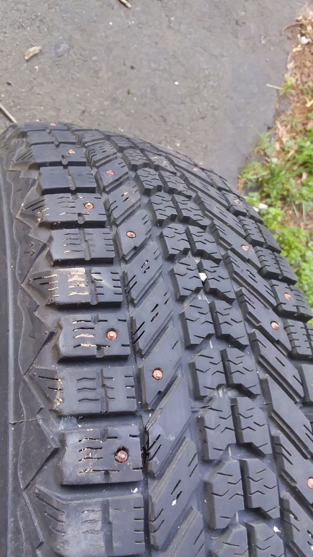 4 studded snow tires on rims
