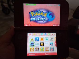 3Ds Red, with 7 games