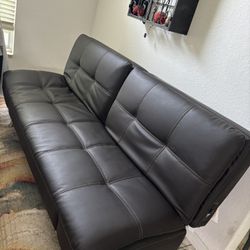 Futon Couch Faux Leather Looks New