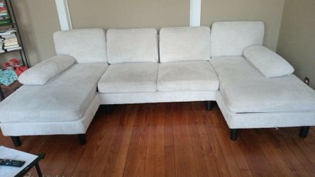 Cream corduroy modular sofa.