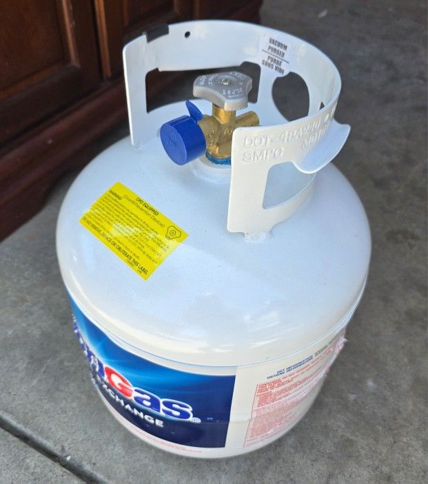 BRAND NEW PROPANE TANK FULL