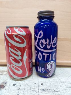 Hand Painted Bottle. Professional Sign Painter